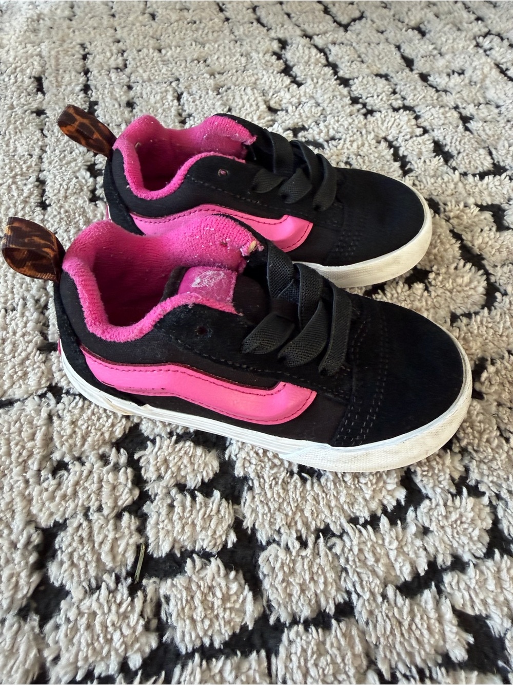 Kids Black and Pink Low-Top Vans Sneaker